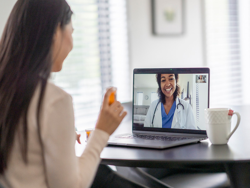 Woman getting online consultation